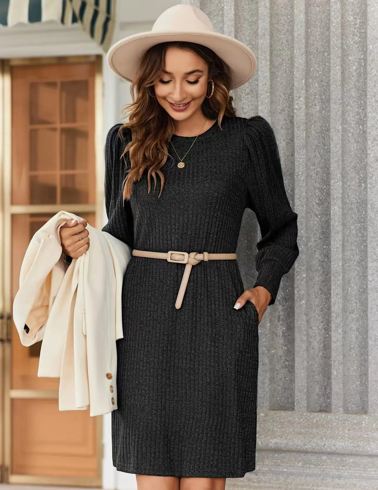Fashionable women's knitted puffed-sleeve long-sleeved autumn and winter round-neck casual loose dress with pockets