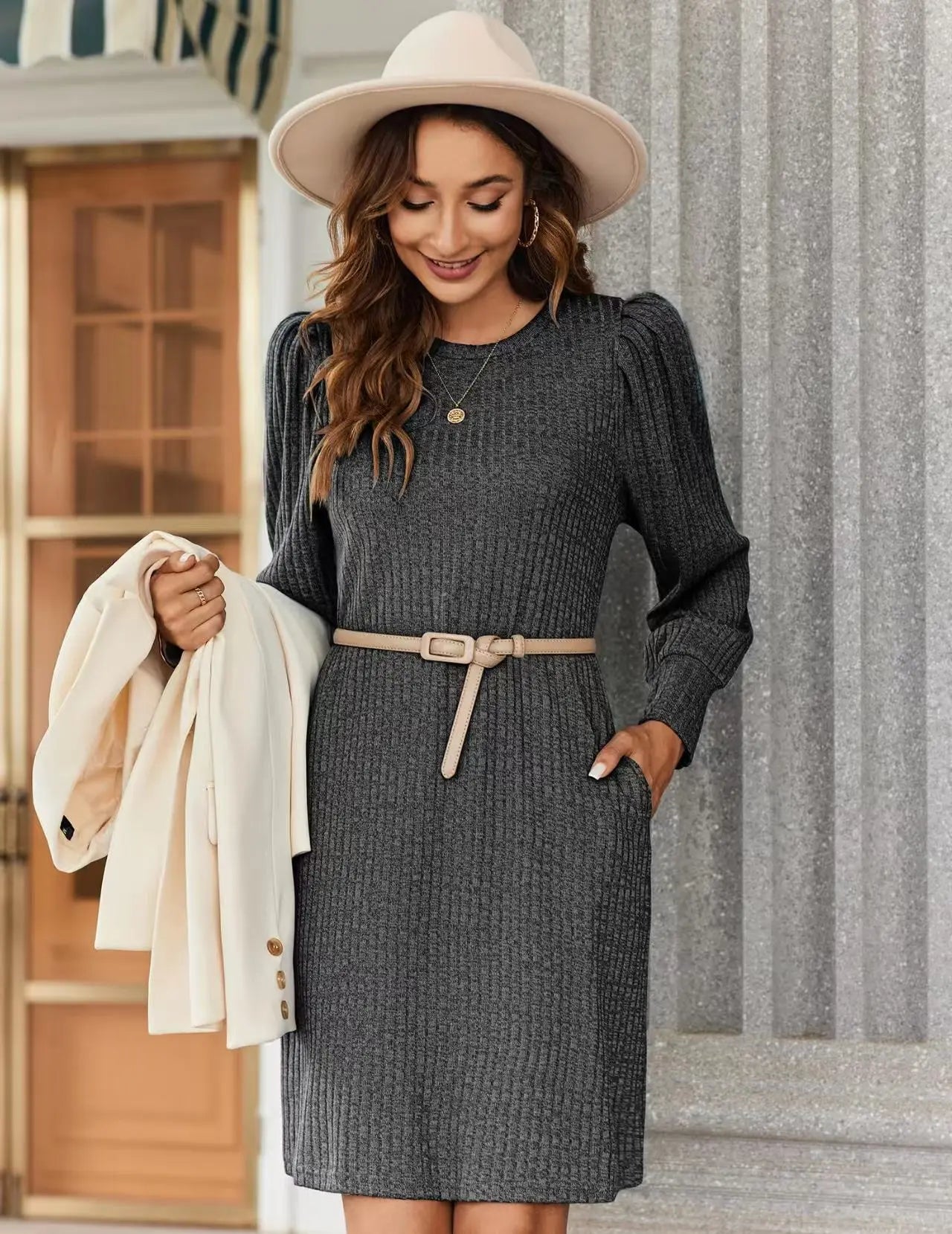 Fashionable women's knitted puffed-sleeve long-sleeved autumn and winter round-neck casual loose dress with pockets